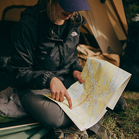 A woman looking at a map